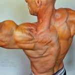 natural bodybuilder scooby back bicep flex